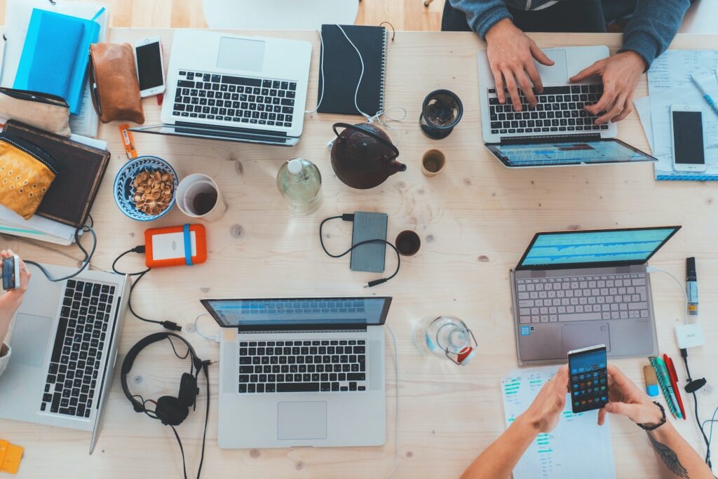 messy laptops on a table